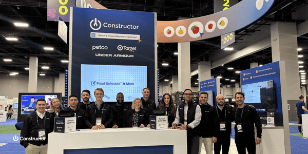 Constructor team standing by our Shoptalk booth